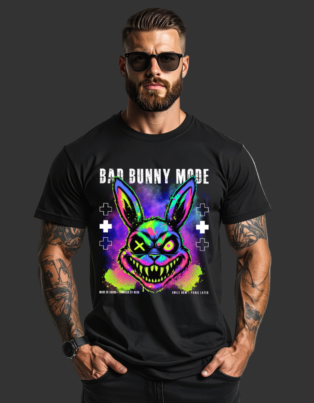 Man wearing a black t-shirt with a colorful bunny graphic and text.