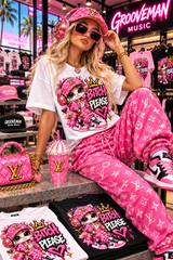 Blonde fashion model wearing white Bitch Please cat graphic T-shirt inside Grooveman Music Miami Beach
