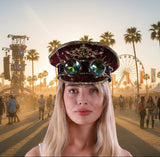 Person wearing a decorative headpiece with gemstones on a white background