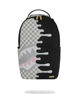 Backpack with shark design and checkered pattern on a white background
