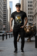 Black t-shirt with a cartoon character holding money on a hanger against a dark background