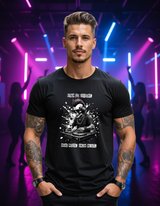 Man wearing a black t-shirt with a graphic design on a city street