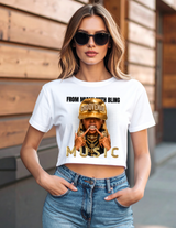 Woman wearing a white t-shirt with a graphic design and text, standing outdoors.