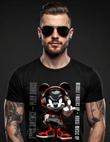 Man wearing a black t-shirt with a graphic design of a character wearing headphones and sneakers on a dark background.