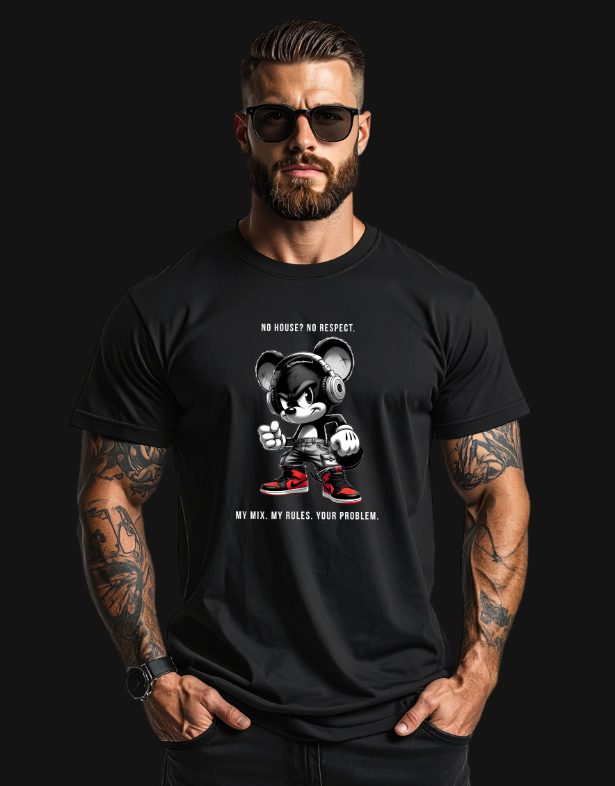 Man wearing a black t-shirt with a graphic design and text, standing against a plain background.