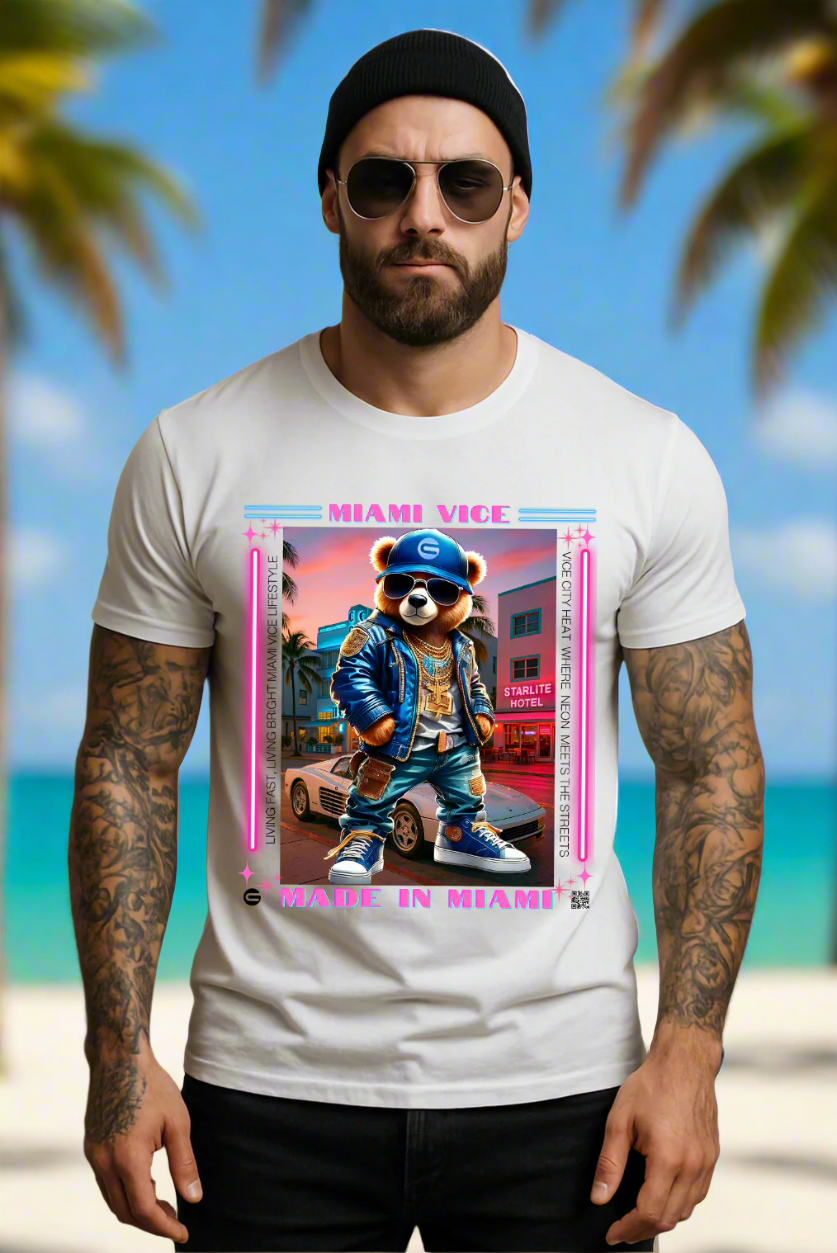 Man wearing a white t-shirt with a graphic of a bear in a Miami Vice style outfit on a beige background.