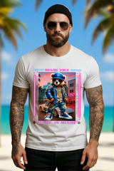 Man wearing a white t-shirt with a graphic of a bear in a Miami Vice style outfit on a beige background.