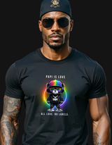 Man wearing a black t-shirt with a colorful graphic and text on a city street.