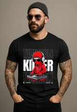 Man wearing a black t-shirt with a graphic design of a person in a red outfit on a gray background