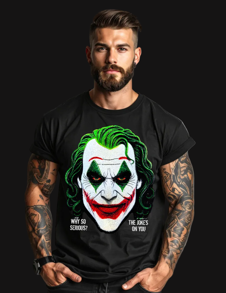 Man wearing a black t-shirt with a Joker graphic design on a gray background