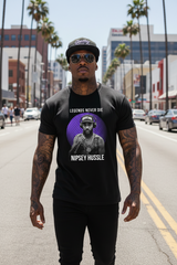 Black t-shirt with Nipsey Hussle graphic and 'Legends Never Die' text on a dark background