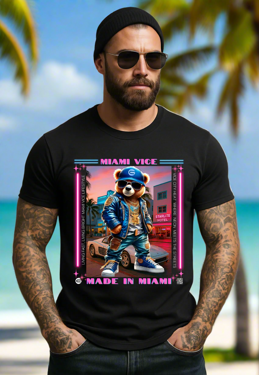 Man wearing a black t-shirt with a graphic of a bear in a 'Miami Vice' style outfit on a gray background.