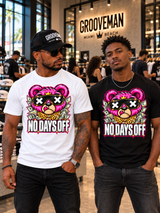 Two models wearing white and black No Days Off pink teddy bear T-shirts inside Grooveman, with shoppers behind them.