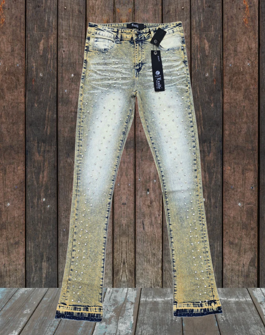 Distressed jeans on a wooden background