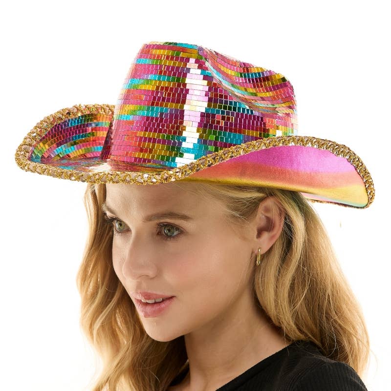 Woman wearing a colorful sequin cowboy hat on a white background