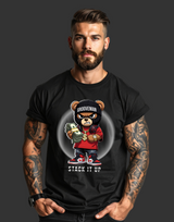 Man wearing a black t-shirt with a bear graphic and text on a gray background