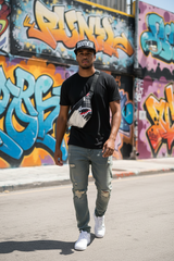 Silver and black fanny pack with shark design on a white background