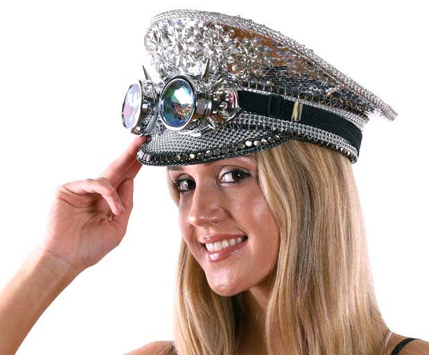 Woman wearing a decorative hat with gemstones on a white background