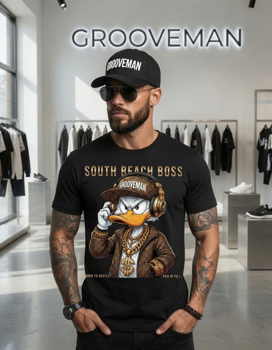Man wearing a black t-shirt with a graphic design and 'Grooveman' cap in a store setting.