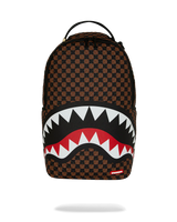 Backpack with checkered pattern and shark mouth design on a white background