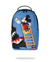 A blue backpack featuring a Mickey Mouse climbing a ladder to drink from a water droplet, with a shark mouth design on the lower left side and a small Disney logo patch near the bottom right.