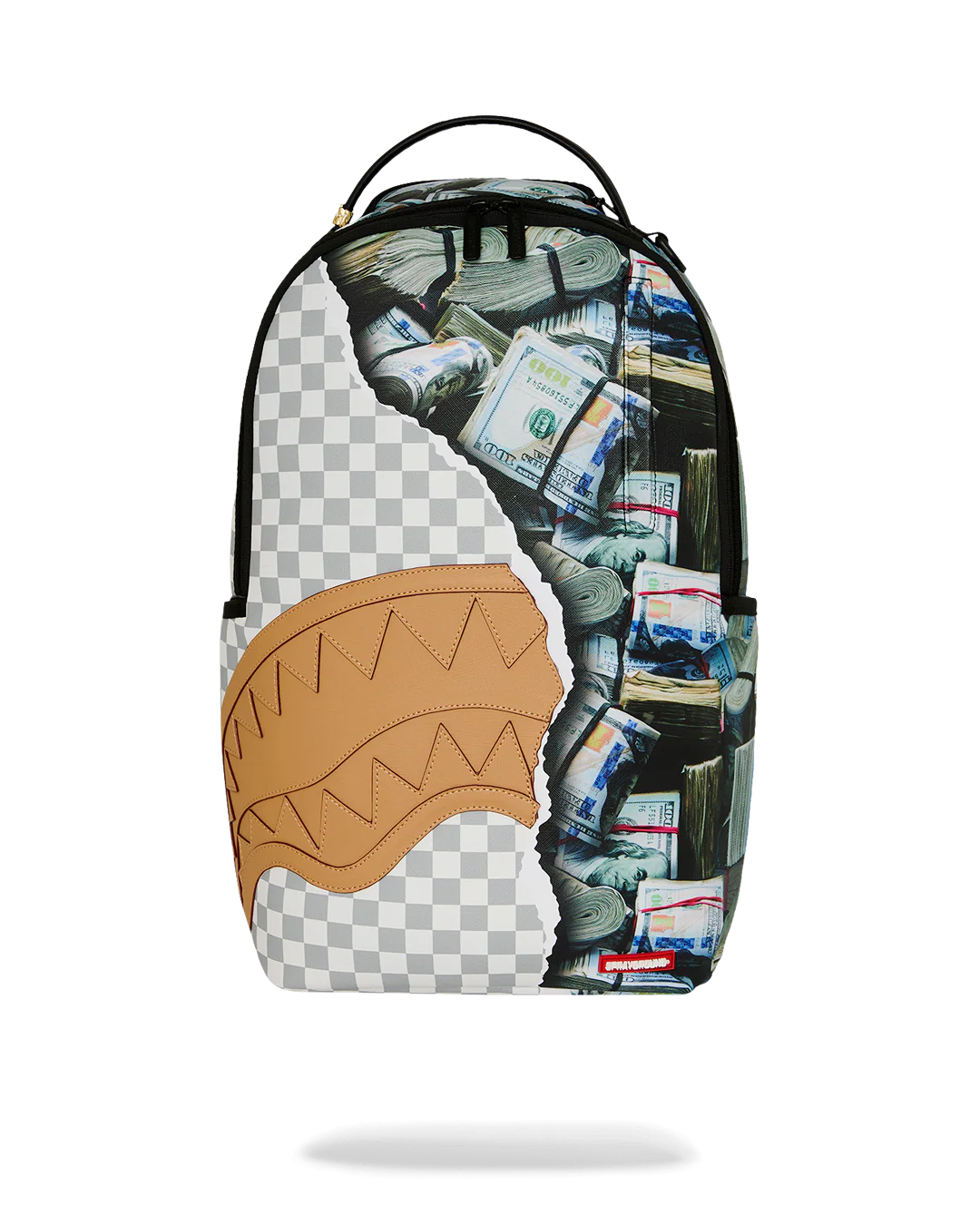 A Sprayground shark backpack with a graphic design featuring a tan leather-look shark mouth, a gray and white checkered pattern, and a collage of cash and stacks on the right side, shown against a plain white background.