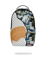 A Sprayground shark backpack with a graphic design featuring a tan leather-look shark mouth, a gray and white checkered pattern, and a collage of cash and stacks on the right side, shown against a plain white background.