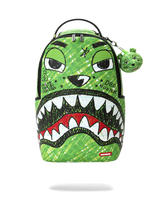 A green Spraycraft backpack featuring a stylized shark-face graphic with black, white, and red details, a top handle, and a small matching green keychain charm.
