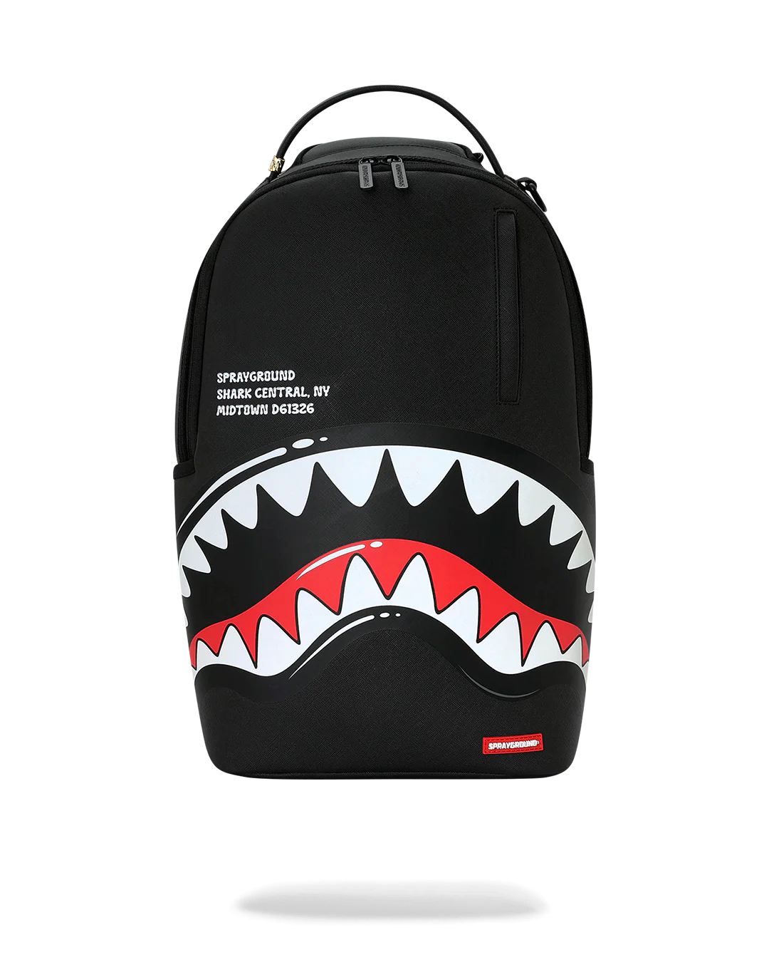 Black backpack with shark mouth design and visible branding on a white background