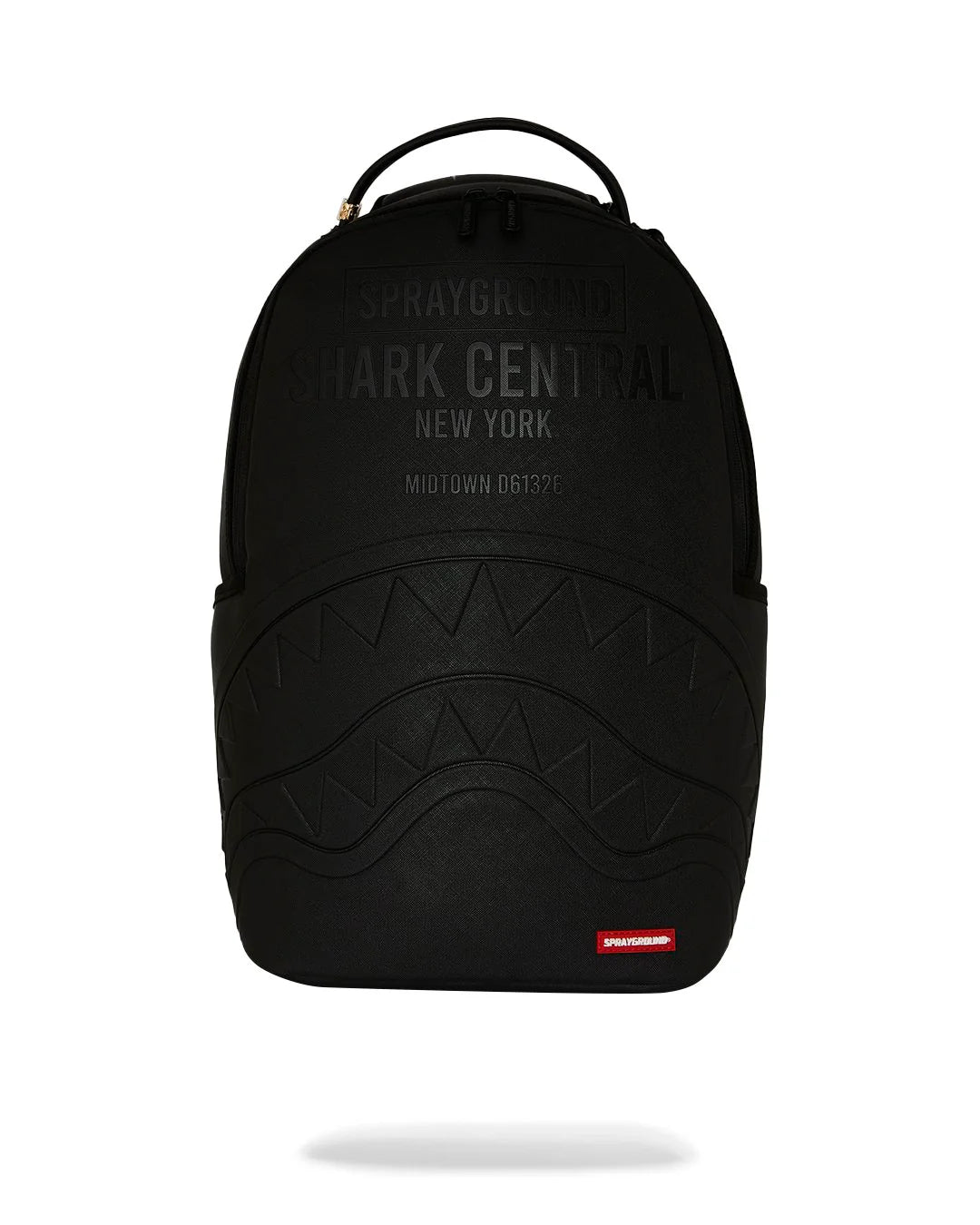 A black Sprayground Shark Central backpack with embossed shark mouth details and tonal black text on the front, shown against a plain white background with a soft shadow underneath.
