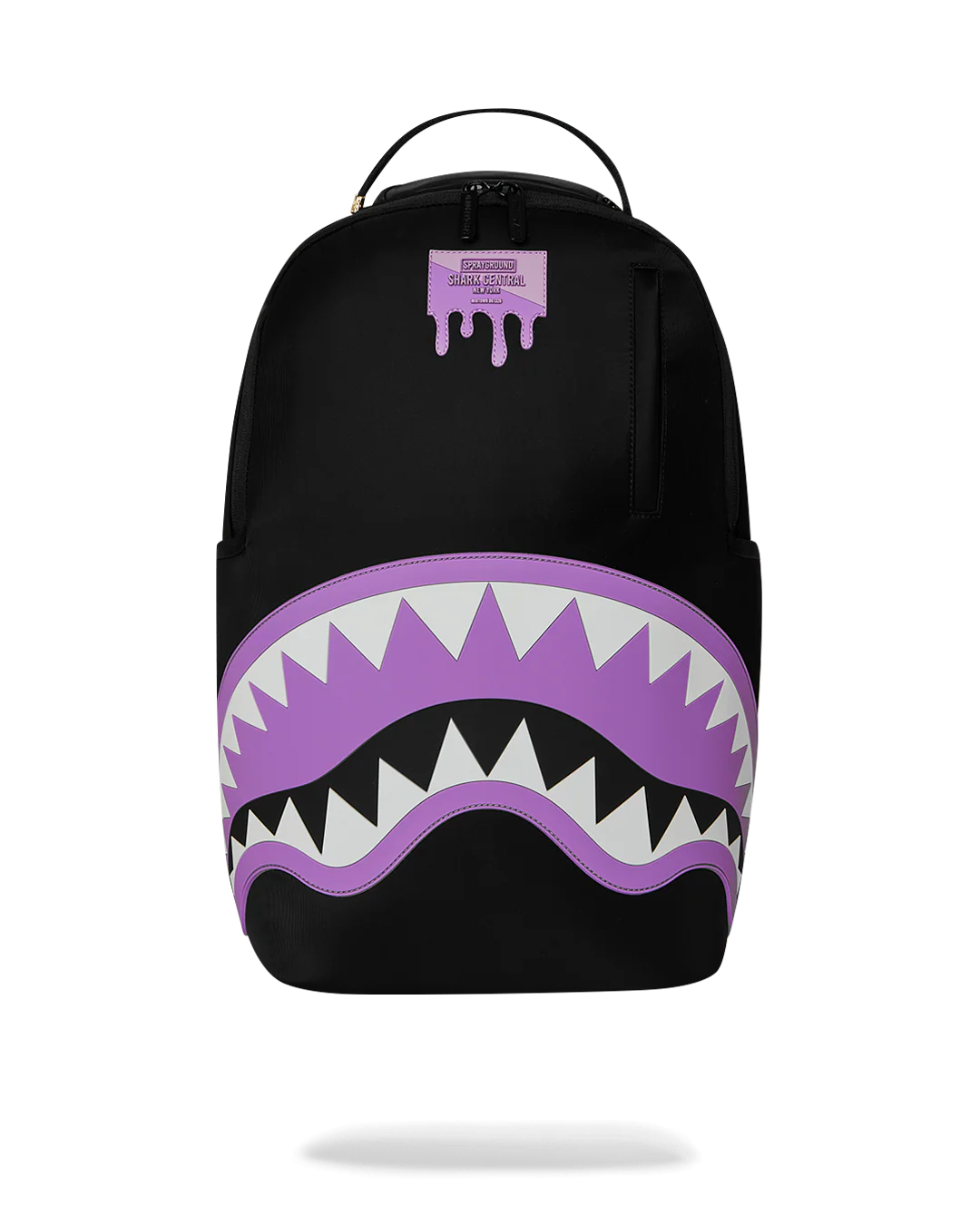 Black backpack with purple shark mouth design on a white background