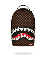 Backpack with a checkered pattern and shark mouth design on a white background