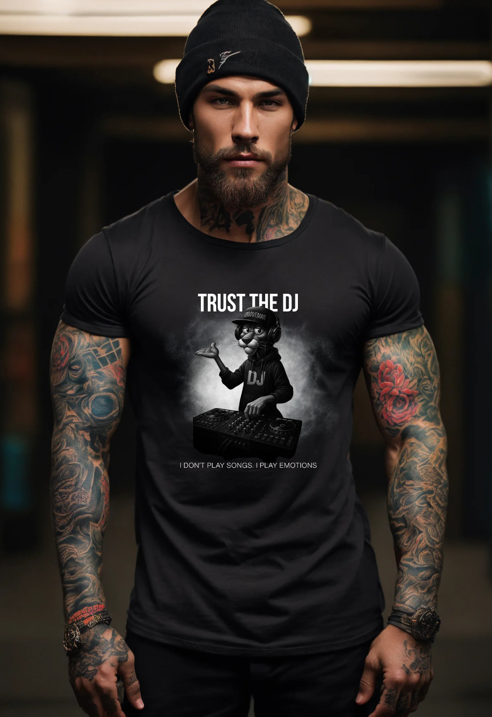 Man wearing a black t-shirt with 'Trust the DJ' graphic design.