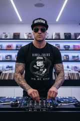 Black t-shirt with vinyl record player graphic and text on a dark background